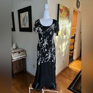 Black and white beaded evening dress with short sleeves.